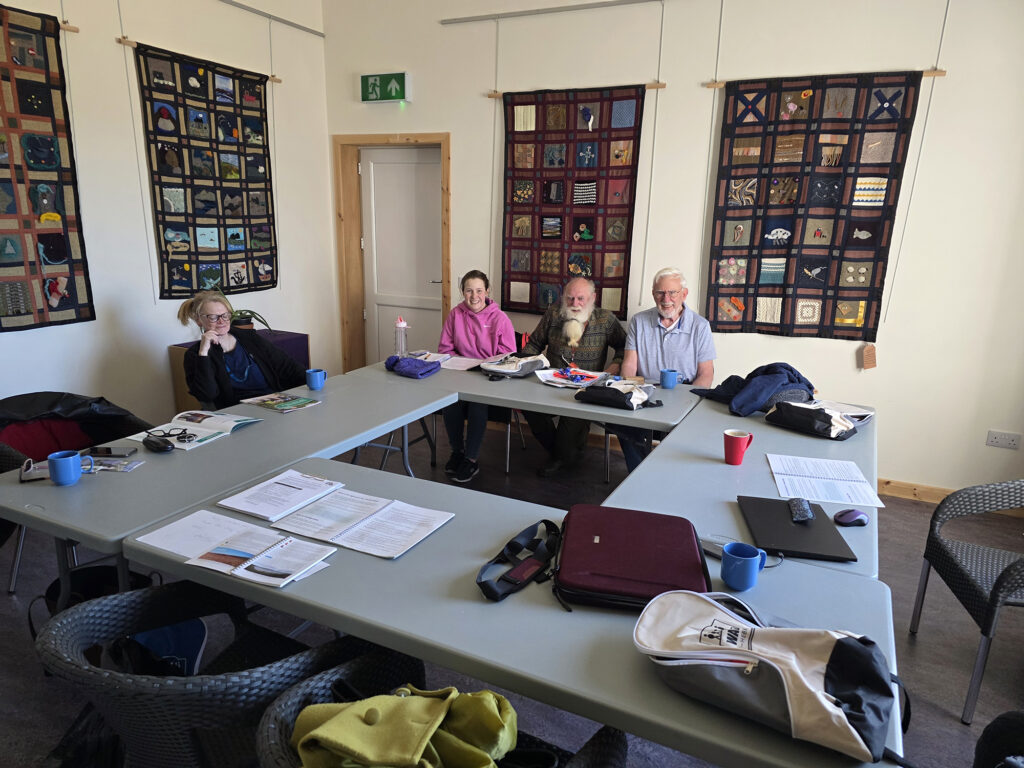 Strength and Balance training held on Grimsay (L-R): Rosie Moar (Dementia Support Worker, Tagsa Uibhist), Sarah Campbell (Grimsay Community Engagement Officer), Simon Davies (Walk Leader) and Peter Dense (Walk Leader).